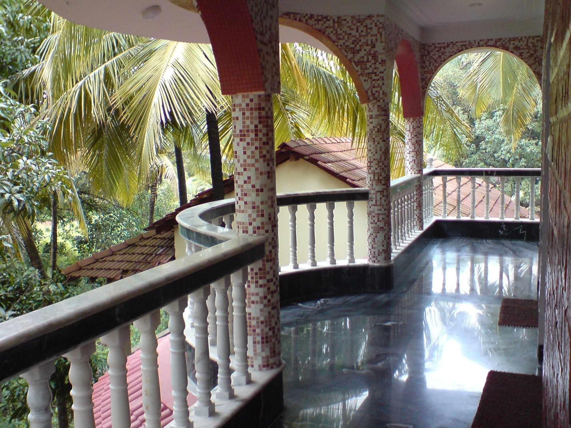 Mama Mids Home Morjim Buitenkant foto